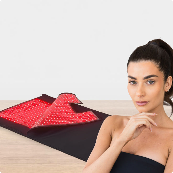 Woman In Front Of Red Light Therapy Blanket