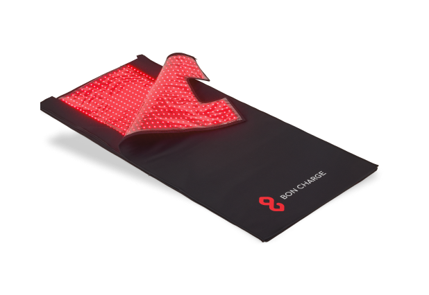 Red Light Therapy Blanket On Grey Background